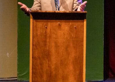 Superintendent Michael Davies-Hughes addresses the audience at the Seal of Biliteracy Awards
