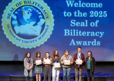 Students with their Seal of Biliteracy Awards