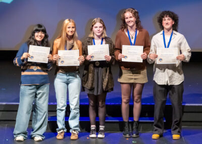 Students with their Seal of Biliteracy Awards