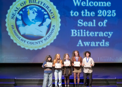 Students with their Seal of Biliteracy Awards