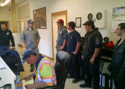 Students gather with Humboldt Bay Municipal Water District employees to learn about the day to day