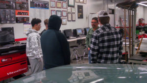 students visit auto shop