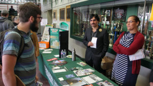 Student talks to reps at College Expo