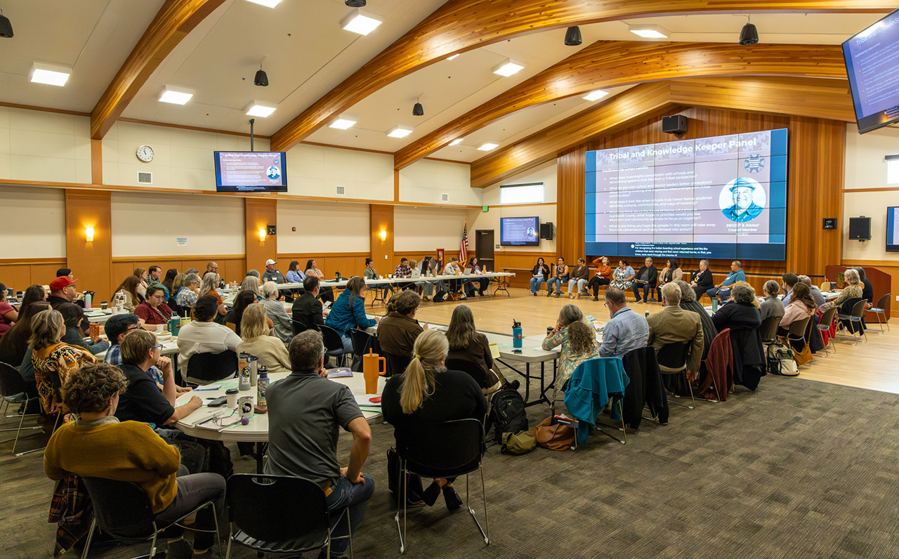 Attendees listen to a speaker panel at the Meaningful Consultation Series event.